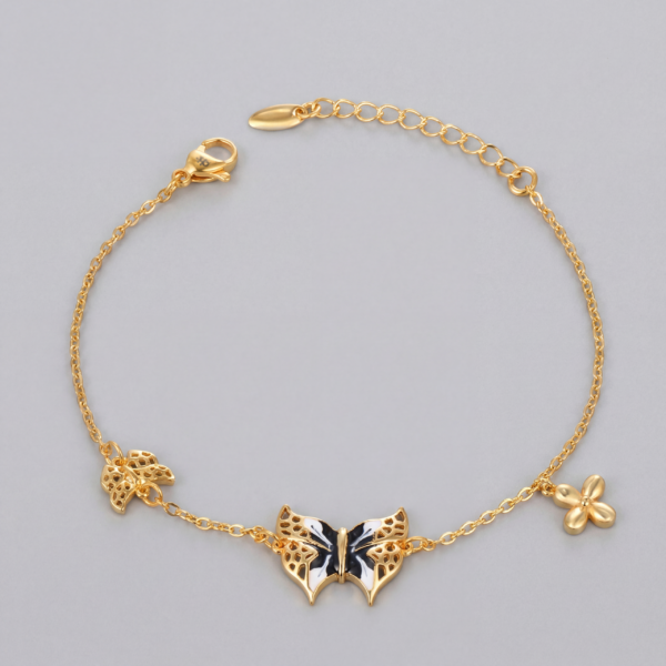 Solisita Enamel Butterfly Charm Bracelet Gold Tone Black and White Detail