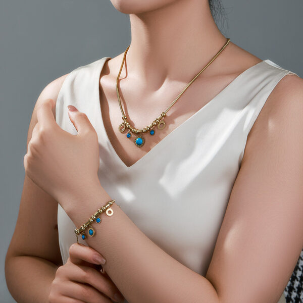 Solisita Turquoise and Roman Numeral Snake Chain Set Gold Tone Stainless Steel Design